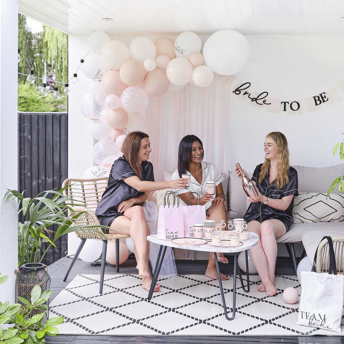 Women sitting chatting and drinking wine