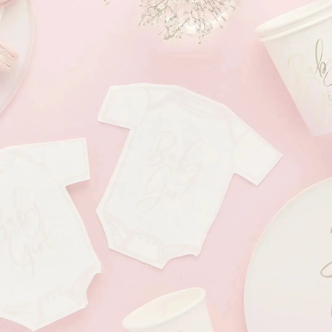 White and pink baby shower napkin. Babygrow shape with Baby Girl on the front