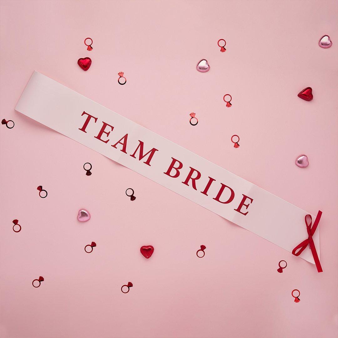 Pink & Red Team Bride Paper Sashes - She’s Tying The Knot Hen Party Accessories - Coquette Hen Do Sashes With Red Satin Ribbon - Pack of 5 - Jolie Fete UK
