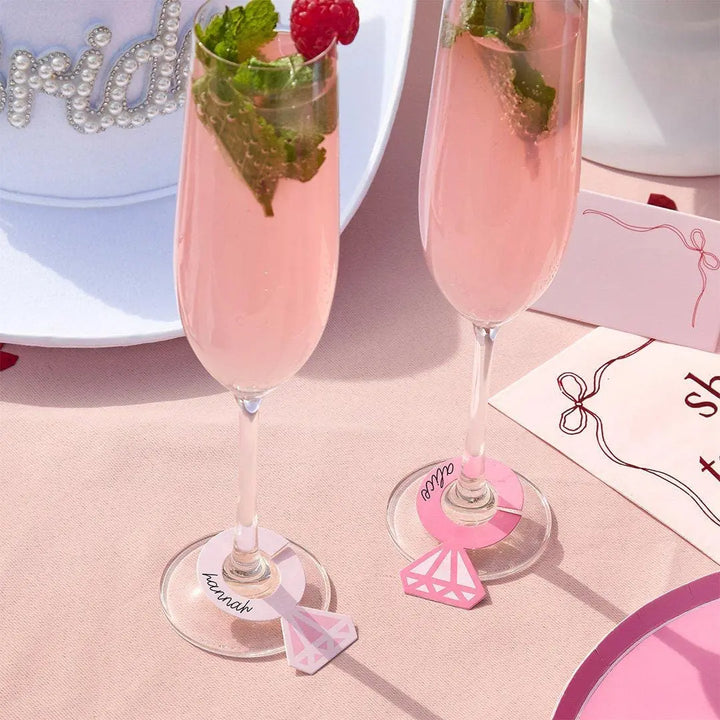 Hen Party Pink Ring Glass Markers - She’s Tying The Knot Drink Charms - Coquette Bride To Be Party Decorations - Hootyballoo - Pack of 12 - Jolie Fete UK