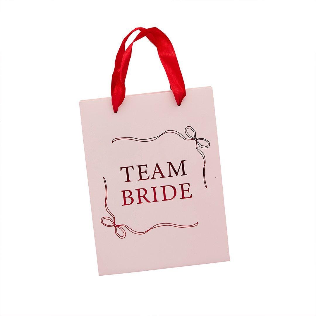 Team Bride Party Bags - Pink & Red She’s Tying The Knot Hen Do Gifts - Coquette Hen Party Gift Bags with Red Satin Handles - Pack of 5 - Jolie Fete UK