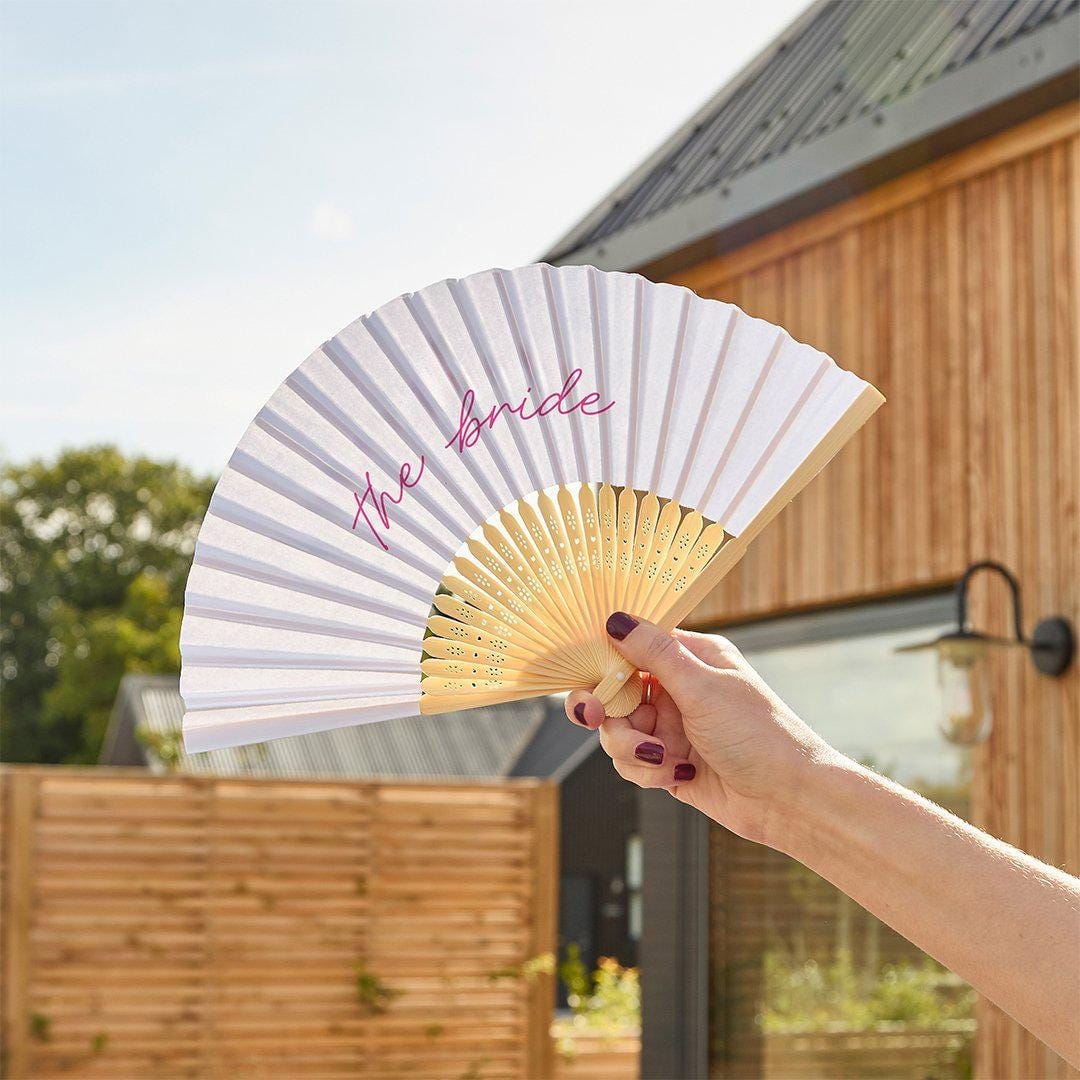 White Bride Hand Fan - Hen Party Fan - She’s Tying The Knot Coquette Bride To Be Accessory - White Paper Fan with Pink Script - Pack Of 1 - Jolie Fete UK
